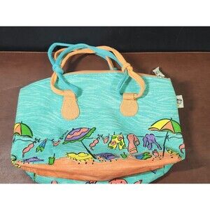 Sally Huss beach tote featuring a colorful, whimsical beach scene with umbrellas